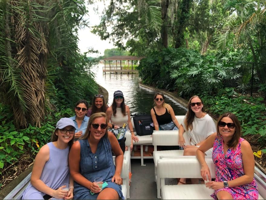 A group of women on a scenic boat tour in Winter Park, FL