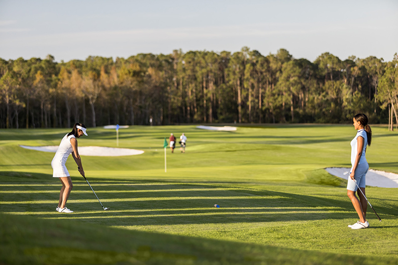 Two women golfing in Orlando