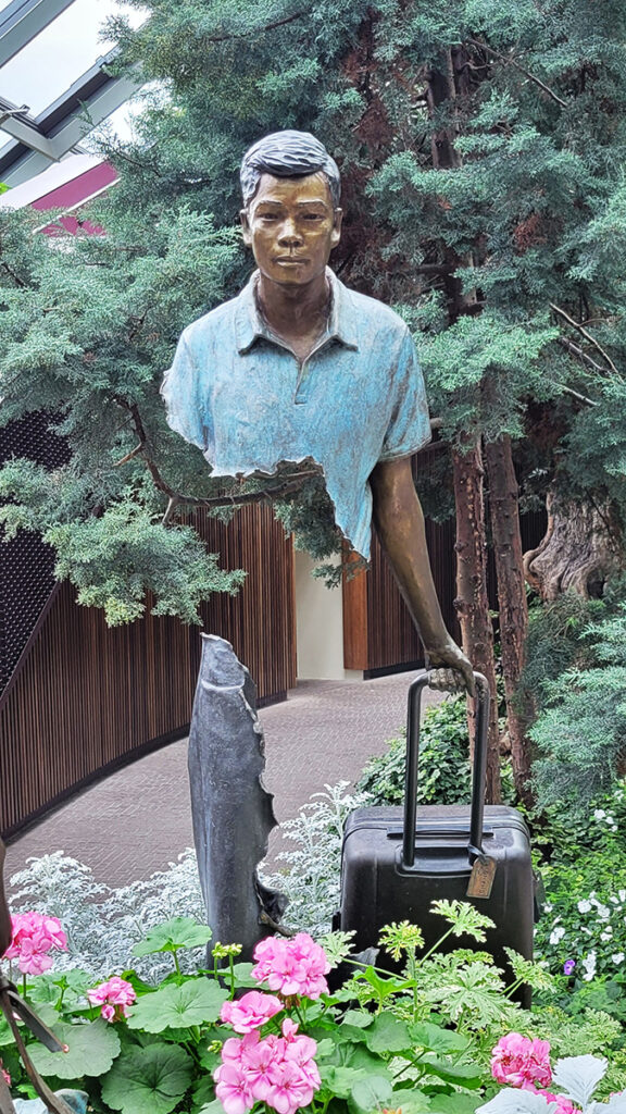 The statue of a man with his mid-section missing