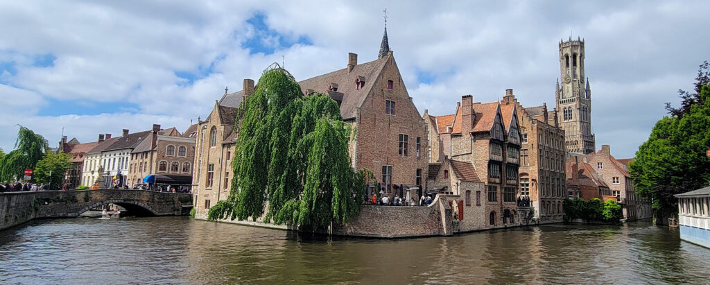 The intersection of two canals in Bruges, Belgium.