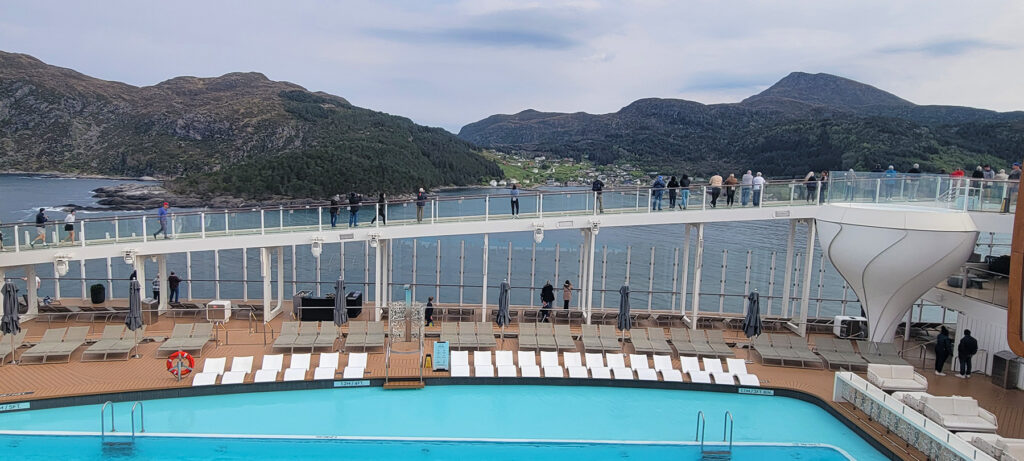 The walking track on the Celebrity Apex with the scenery in Nordfjord, Norway in the background.