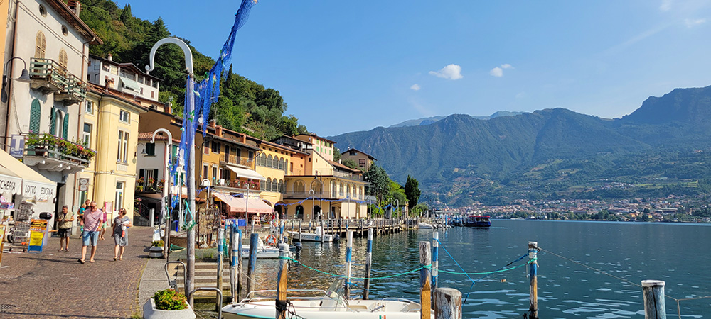 A walkway along an Italian waterfront in Monte Isola on Lake Iseo