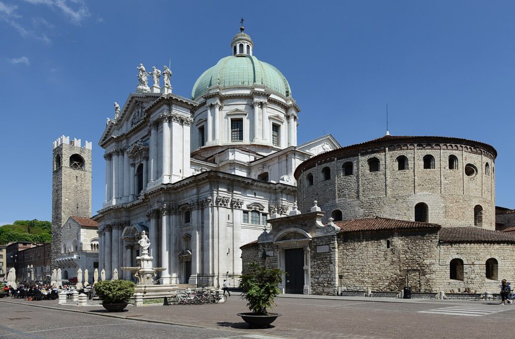 A 17th century cathedral sitting next to a 12th century cathedral.